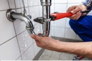 Plumbing services being performed in Singapore.