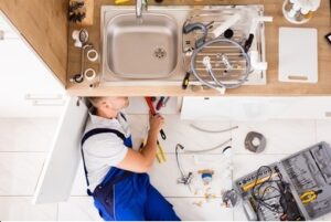 Professional plumber fixing pipes in Singapore