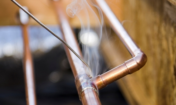fix a pinhole leak in copper pipe