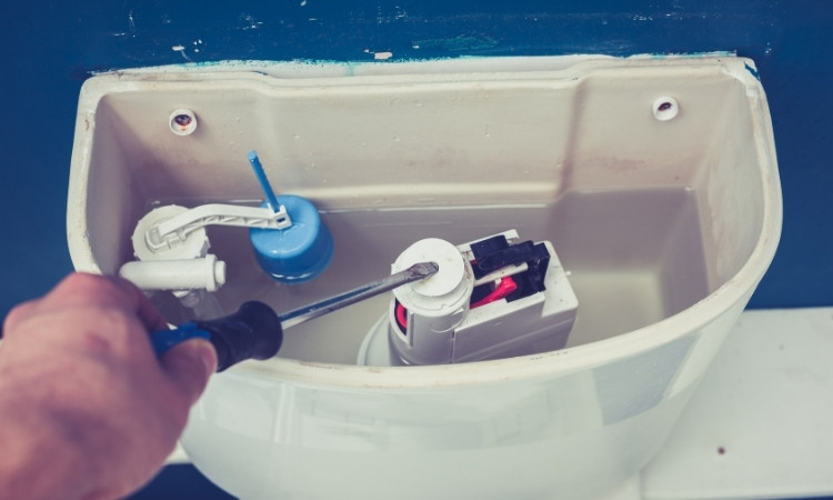 replace a toilet fill valve